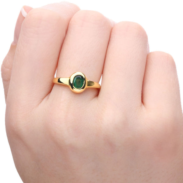 Anel em Ouro 18 k com Esmeralda Oval