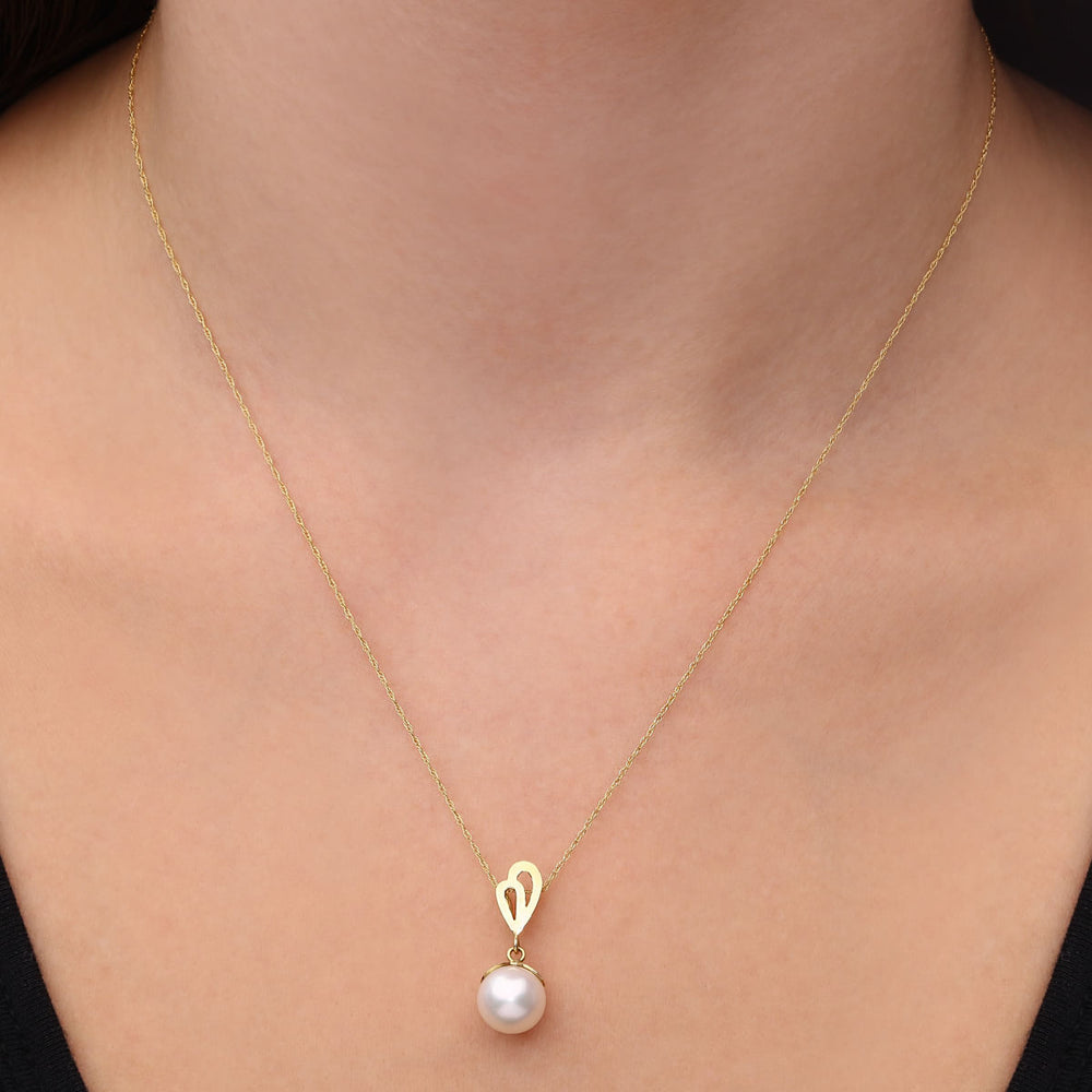 Pingente em Ouro Amarelo 18k com Perola Branca