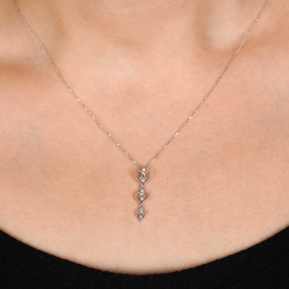 Pingente em Ouro Branco 18k Corações com Diamantes