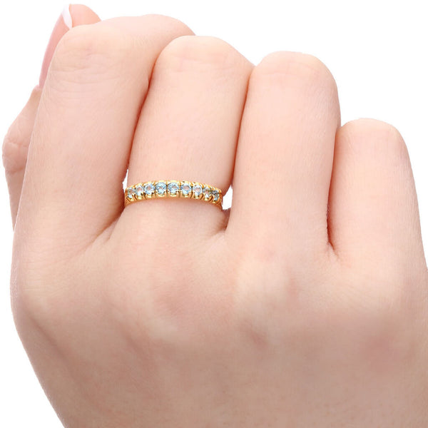 Meia Aliança em Ouro Amarelo 18k com Topazios Sky Blue