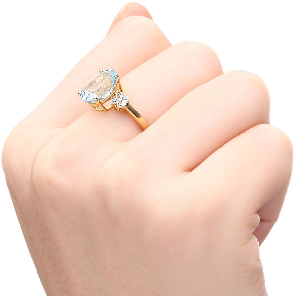 Anel em Ouro Amarelo com Água Marinha Oval e Diamantes