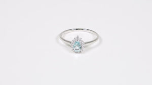 Anel em Ouro Branco 18k com Topazios Azuis e Diamantes